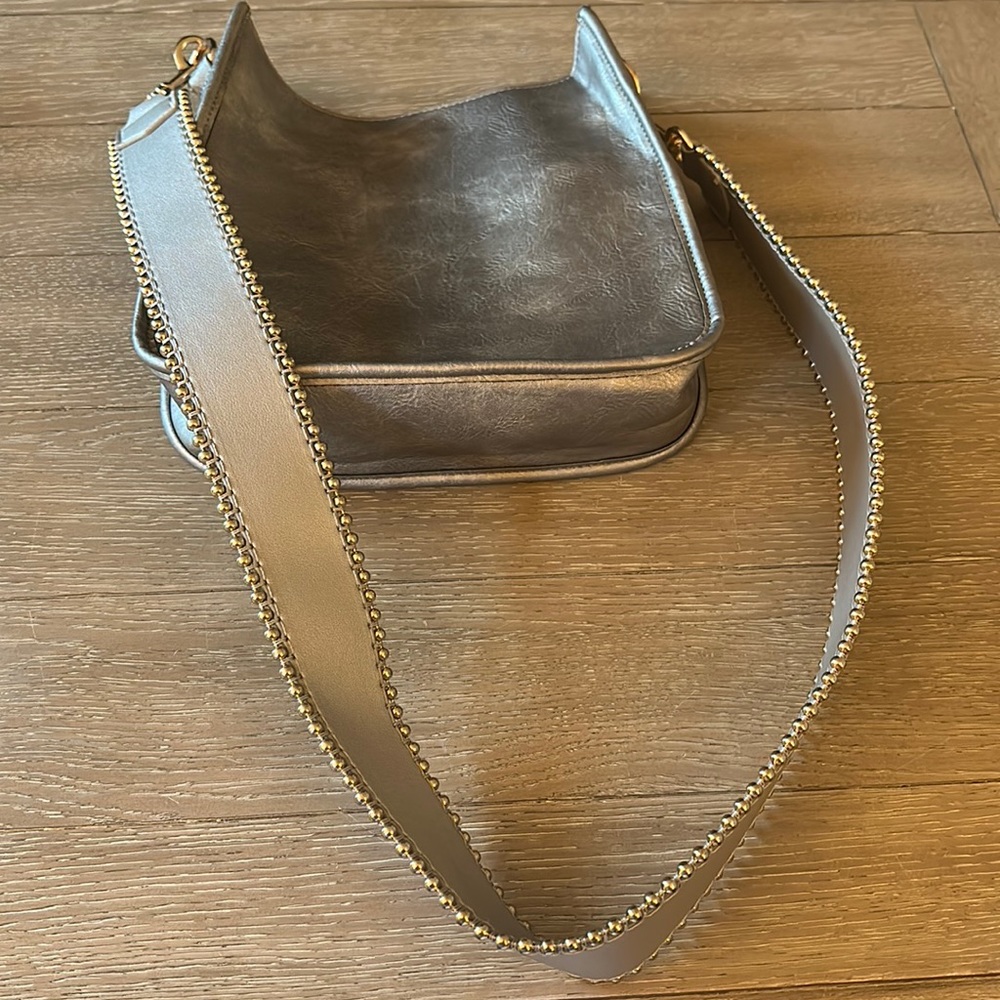 Ah-dorned crossbody bag